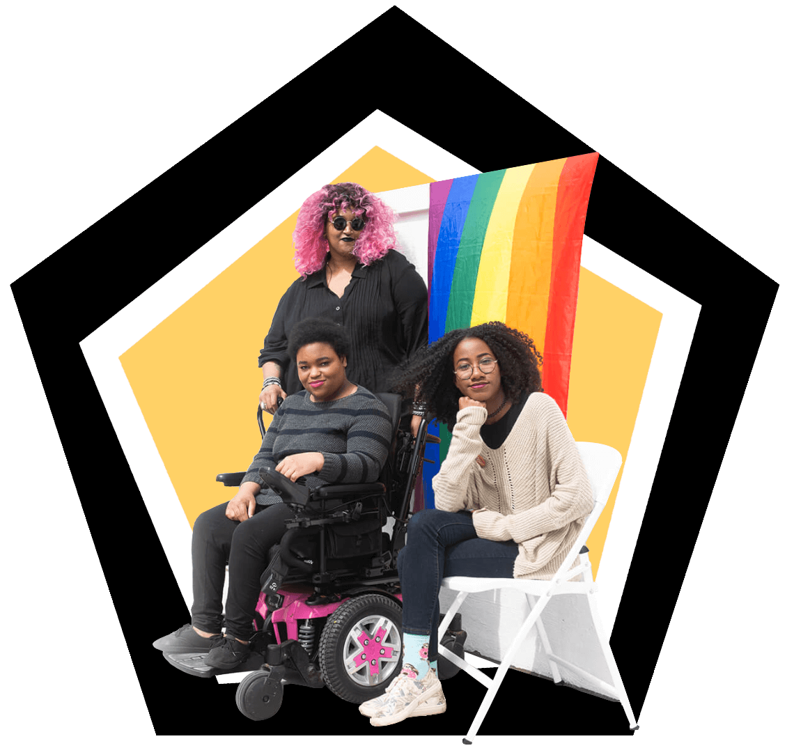 3 disabled and Black folx in front of a pride flag
